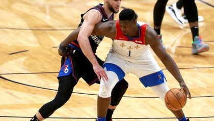  恩比德复出76人终结连败  